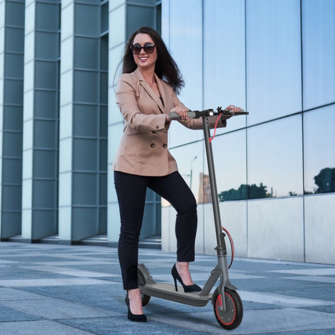 8.5" Solid Tires Electric Scooter , 350W Motor, Up to 19 MPH and 21-23 Miles Long-Range Portable Foldable Commuting Scooter for Adults with Double Braking System and App